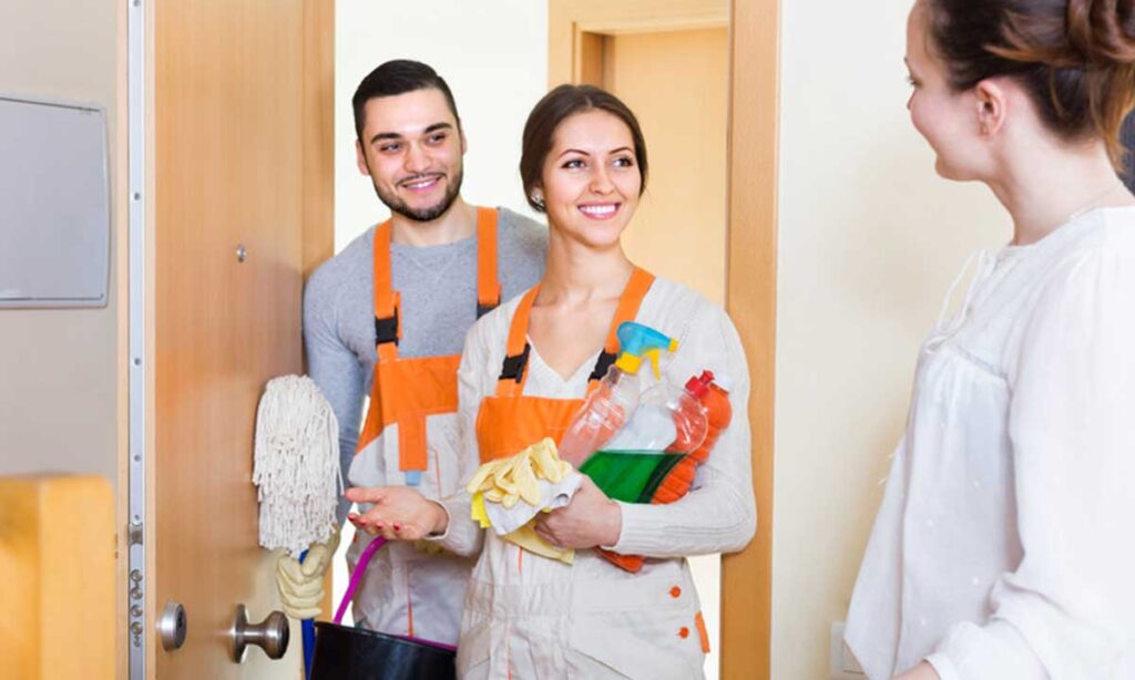 Cleaning staff smiling